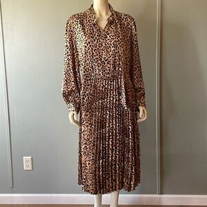 On - 34th pleated ,long sleeves dress , size Large